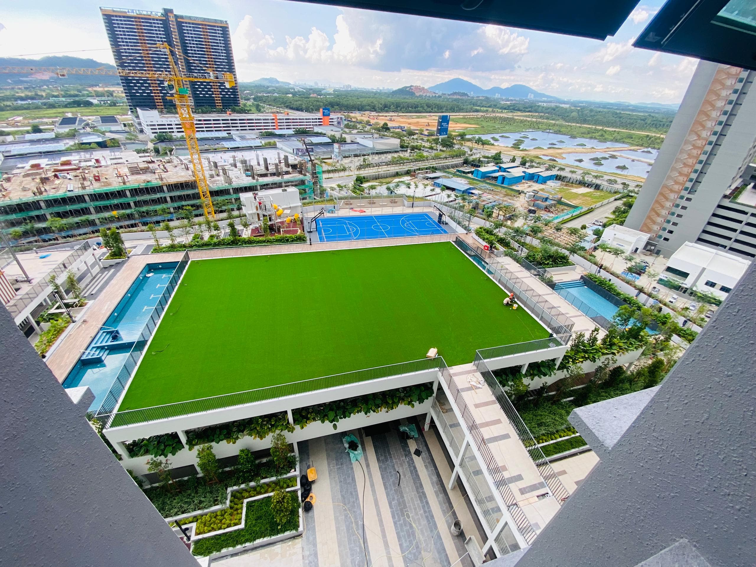 Artificial grass installation at Savana Residence in Penang, view 1